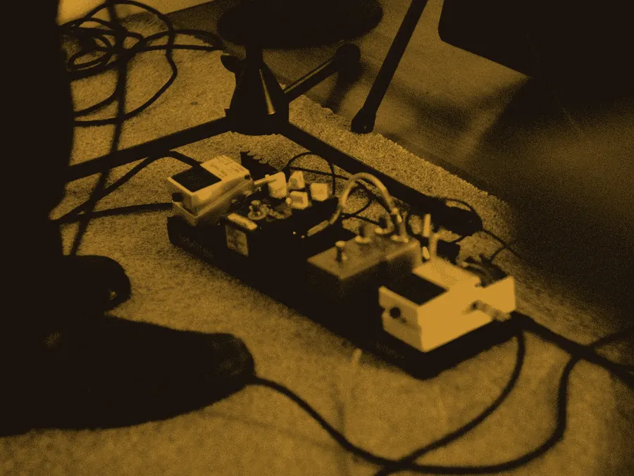 Guitar effects pedals on the stage floor