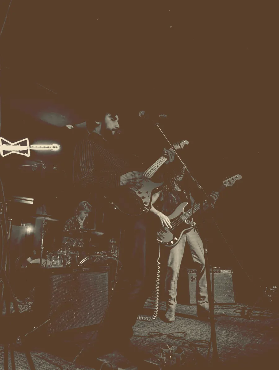 Ultracrepidarian on stage under red lighting